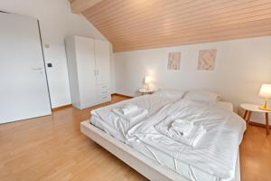 Voodi või voodid majutusasutuse Villa architecte lumineuse avec jardin privé toas