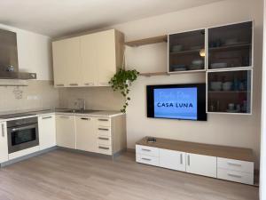 Kuchyň nebo kuchyňský kout v ubytování Casa Luna a Porto Pino
