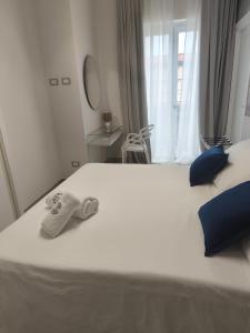 Postel nebo postele na pokoji v ubytování B&B Aura