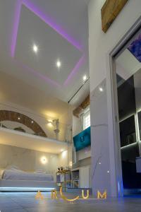 Postel nebo postele na pokoji v ubytování ARCUM suites