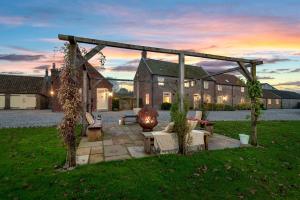 a house with a gazebo in the yard at Stables 2 bedrooms in Beverley