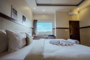 Postel nebo postele na pokoji v ubytování Homely Bali at Seminyak