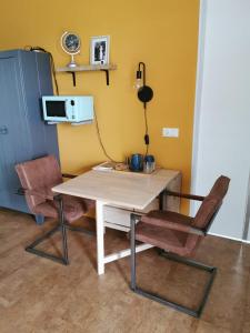 Η κουζίνα ή μικρή κουζίνα στο Studio De Logeerruimte