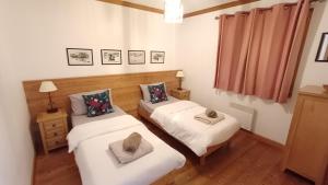 Katil atau katil-katil dalam bilik di Chalet Apartment Monêtier +41 gambar