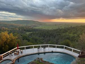 a swimming pool on top of a mountain with a view at Breathtaking view of the Hills with HotTub, Pool and Pool Table in Marble Mountain
