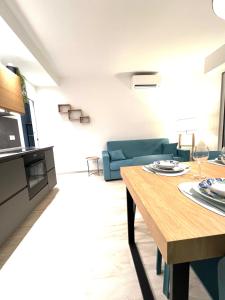 TV a/nebo společenská místnost v ubytování Appartamento Cielo e Mare + 3 fotografie
