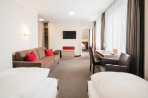 Postel nebo postele na pokoji v ubytování Hotel Rennschuh