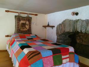 Tempat tidur dalam kamar di La Cantina Del Sole
