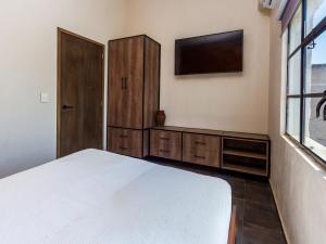 Voodi või voodid majutusasutuse Ihost Chapultepec toas