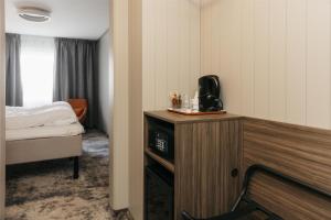 Ένα ή περισσότερα κρεβάτια σε δωμάτιο στο Best Western Plus Kalmarsund Hotell