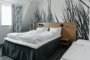 Ένα ή περισσότερα κρεβάτια σε δωμάτιο στο Best Western Plus Kalmarsund Hotell
