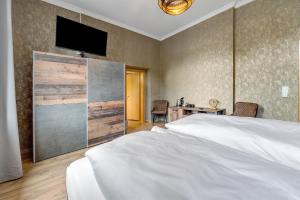 Postel nebo postele na pokoji v ubytování Bed and Breakfast St Wendel