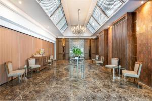 Posezení v ubytování Radisson Suites Bangkok Sukhumvit