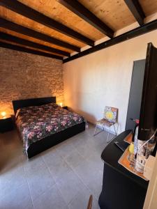 Postel nebo postele na pokoji v ubytování Vigna di pettineo - guest house