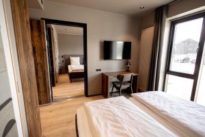 Postel nebo postele na pokoji v ubytování Hotel Melfarhus