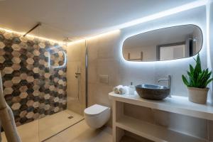 Koupelna v ubytování Ageri Studios + 35 fotografií