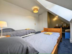 Postel nebo postele na pokoji v ubytování La Rognouse - Maison vue mer