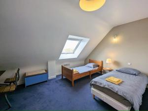 Postel nebo postele na pokoji v ubytování La Rognouse - Maison vue mer