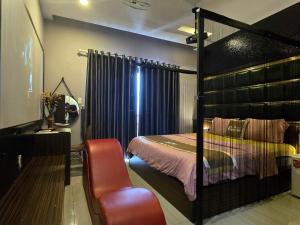 Postel nebo postele na pokoji v ubytování Kha Thy Hotel 2