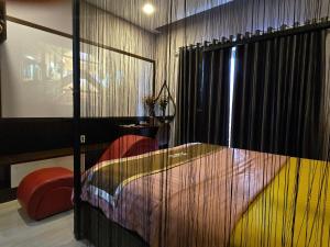 Postel nebo postele na pokoji v ubytování Kha Thy Hotel 2