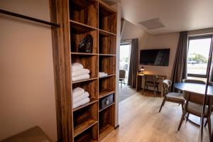 TV a/nebo společenská místnost v ubytování Hotel Melfarhus