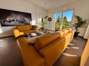 Posezení v ubytování Abstatt Deluxe Loft with Spa