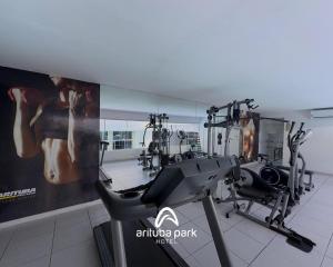 a gym with treadmills and a treadmill at Arituba Park Hotel in Natal
