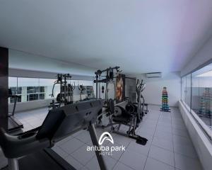 a room with a gym with a treadmill at Arituba Park Hotel in Natal
