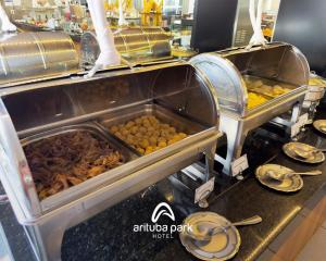 a buffet of food on a counter in a store at Arituba Park Hotel in Natal