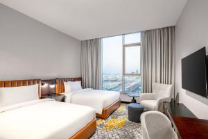 Postel nebo postele na pokoji v ubytování Four Points by Sheraton Jeddah King Fahd Road