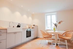Η κουζίνα ή μικρή κουζίνα στο Ilsehof Apartment Ruth