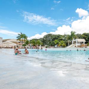 a group of people in the water at a resort at Lacqua diRoma - Serviço de Hotelaria in Caldas Novas