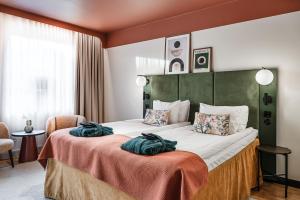 Voodi või voodid majutusasutuse Hotel Fratelli toas