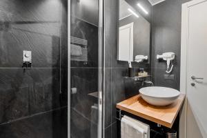 Koupelna v ubytování Three Rooms D'AZEGLIO 12 + 14 fotografií