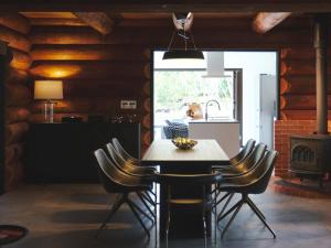 a kitchen and dining room with a table and chairs at Little Deer by SANA in Tateyama