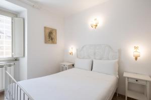 Posteľ alebo postele v izbe v ubytovaní 19 Steps Trevi
