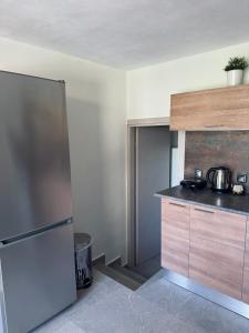 Kuchyň nebo kuchyňský kout v ubytování Moxy Paxos Apartments