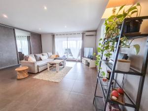 Posezení v ubytování Appartement spacieux avec une belle loggia