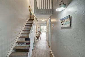 een trap in een huis met een trap bij Surf Condos 531 in Surf City