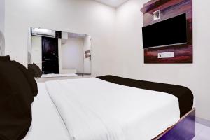 TV a/nebo společenská místnost v ubytování Hotel O Class Inn