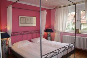 Postel nebo postele na pokoji v ubytování Hotel Stadtresidenz