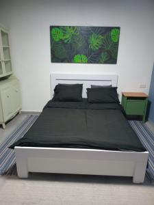 Postel nebo postele na pokoji v ubytování דבש