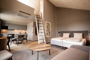 Postel nebo postele na pokoji v ubytování Hotel Melfarhus