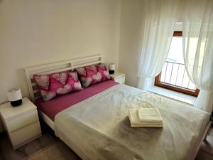 Ένα ή περισσότερα κρεβάτια σε δωμάτιο στο Apartment Veronica +2 φωτογραφίες