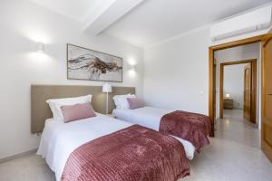 Giường trong phòng chung tại Lagos Town Lovers by Seewest