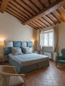 Postel nebo postele na pokoji v ubytování Resort Casale Le Torri