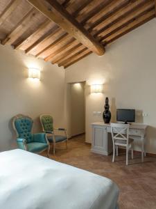 TV a/nebo společenská místnost v ubytování Resort Casale Le Torri