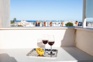 Nápoje v ubytovaní Atico Buen Vivir en Marina Real II by Family Homes