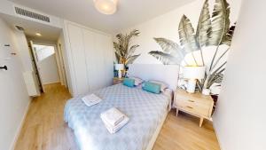 Posteľ alebo postele v izbe v ubytovaní Atico Buen Vivir en Marina Real II by Family Homes