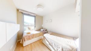 Posteľ alebo postele v izbe v ubytovaní Atico Buen Vivir en Marina Real II by Family Homes